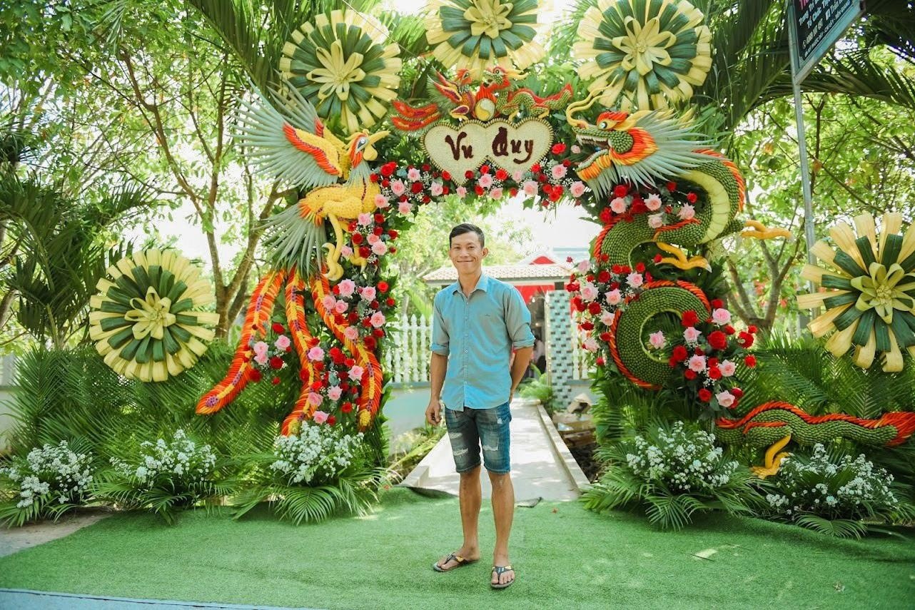 Cổng cưới rồng phụng từ hoa trái tự nhiên, nét độc đáo của miền Tây Cổng cưới rồng phụng từ hoa trái tự nhiên, nét độc đáo của miền Tây